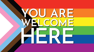 Pride Flag with You Are Welcome Here written on it